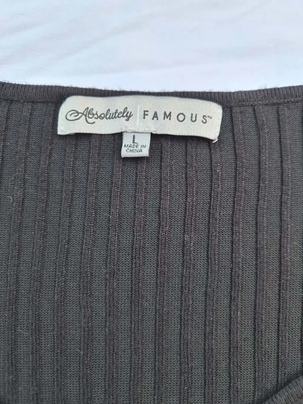 Absolutely Famous Women's Ribbed V-Neck Sweater with Lace Puff Sleeves